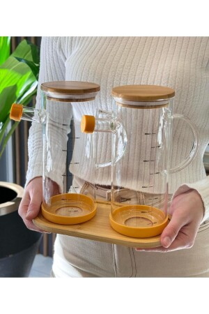 مجموعة من 2 أكواب زيت بوروسيليكات زجاجي و خمر مع قاعدة من الخيزران كوهبة - Onedekor