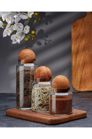 مجموعة من 3 صناديق زجاجية مع كرات خشبية، وعاء السكر، وعاء العشاء، وعاء التوابل وعلبة تخزين - Demirhan Home