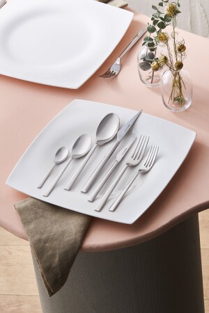 مـنـز-فيلي إليجنـس 84 قطعة طلاء لـ 12 شخصًا 153 03. 08. 08. 1999 - Karaca