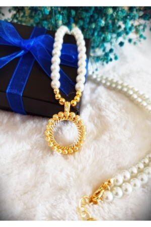 عقدة عنق من ربع قرن من الذهب - Grcstyle