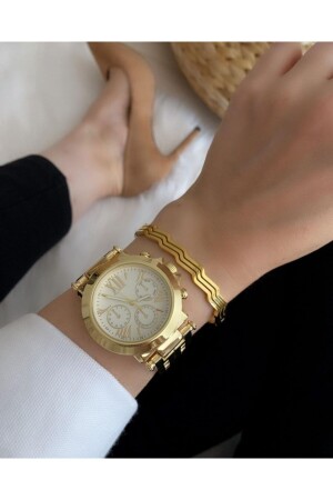 Goldene Unisex-Armbanduhr mit Stahlgehäuse und analoger Uhr İSTLİV78296129666 - 1