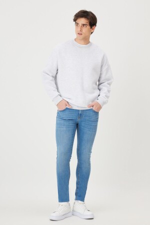 Hellblaue, extra schmal geschnittene Slim-Fit-Riss-Baumwoll-Jeans aus flexiblem Denim für Herren ET0100000002 - 2