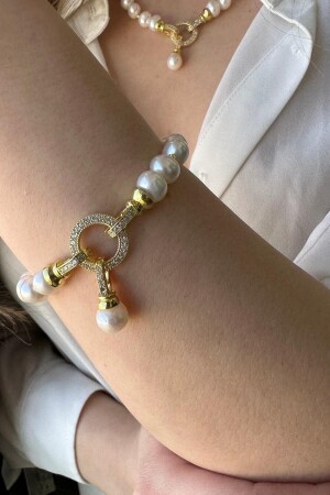 MNZ-925 سبرينغ فولاذي دوريكا للنساء كمية اللؤلؤ سوار ST09955Y - Birinci1926