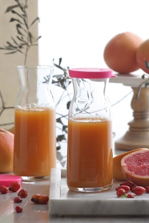 (MNZ-Fonte) تقديم جنجة ماء الكاراف - زجاجة حليب 700 سي سي 2 ليف وردي - Lav