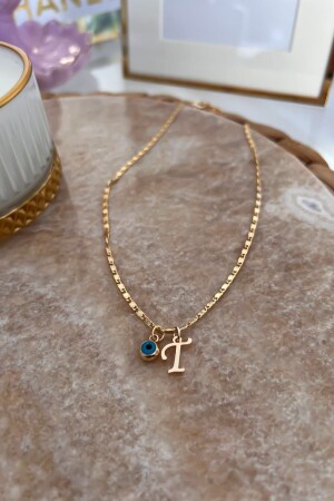 مقعد من سلسلة MNZ-Thin مع حرف T و معلق عيون Evil Eye - Trendy Butik