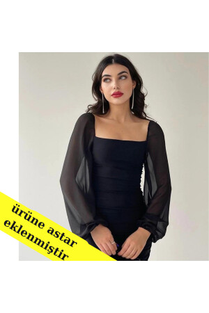 Romantisches schwarzes Bleistiftkleid mit Prinzessinnenärmeln - 1