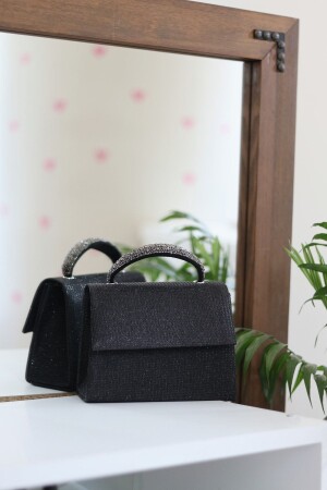 Schwarze Damen-Schultertasche mit silbernem Stein und detailliertem Abendkleid - 2