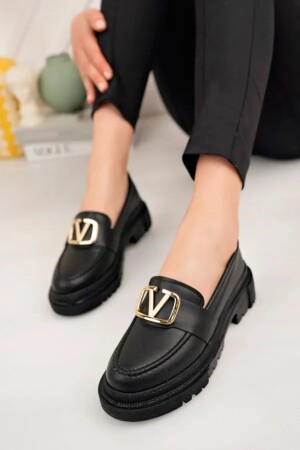 Schwarze Loaferschuhe mit dicker Sohle und V-Schnalle für Damen - 1