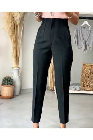 Schwarze, schmal geschnittene Hose mit hoher Taille - 1