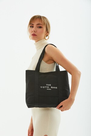 Schwarze U46-Tasche mit Druckknopfverschluss vorne, detaillierte Tragetasche, bestickte Canvas-Damen-Umhängetasche U:30 E - 1